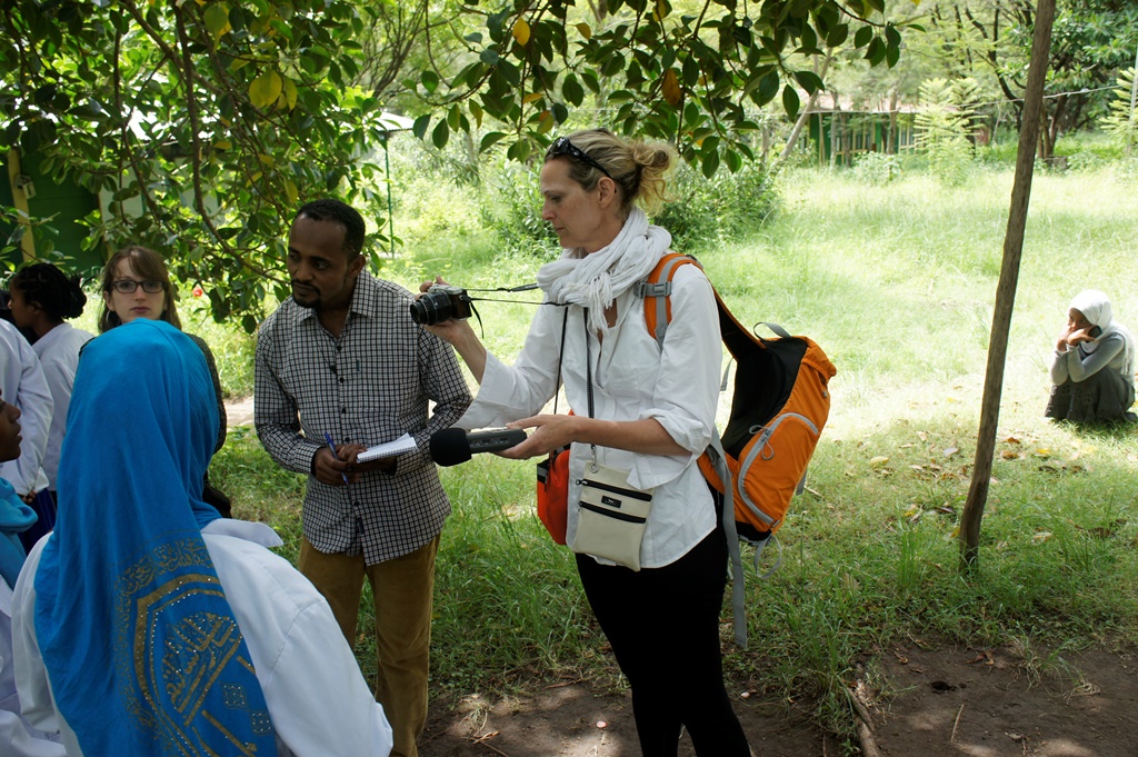 Journalist, Elizabeth Atalay interviews a midwife in training