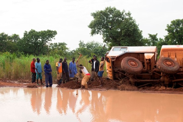 A team of UN Security officials travelled through parts of Central Equatoria, Western Equatoria, and Western Bahr El Ghazal, to assess the state of the road and other conditions, including local conditions that might impact travel. A group of truck drivers take turns clearing earth to drain water from an impassable section of road that has stopped close to 100 trucks on the road linking Western Equatoria and Western Bahr El Ghazal