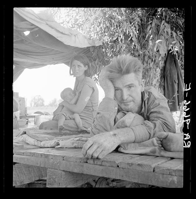 Drought refugees from Oklahoma camping by the roadside. They hope to work in the cotton fields. There are seven in family. Blythe, California. LC-USF34- 009666-E  