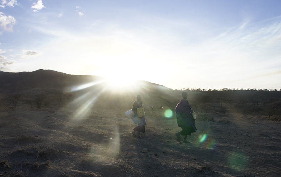 Maasai girls going to get water